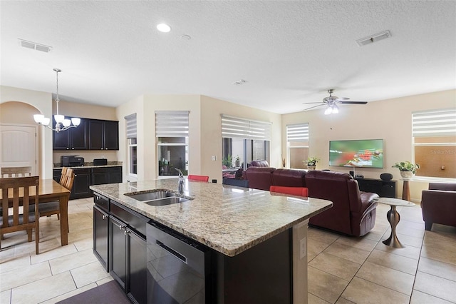 2136 J Lawson Blvd, Orlando, FL 32824 - kitchen featuring a sink, dishwasher, light tile patterned floors, an island with sink, and ceiling fan