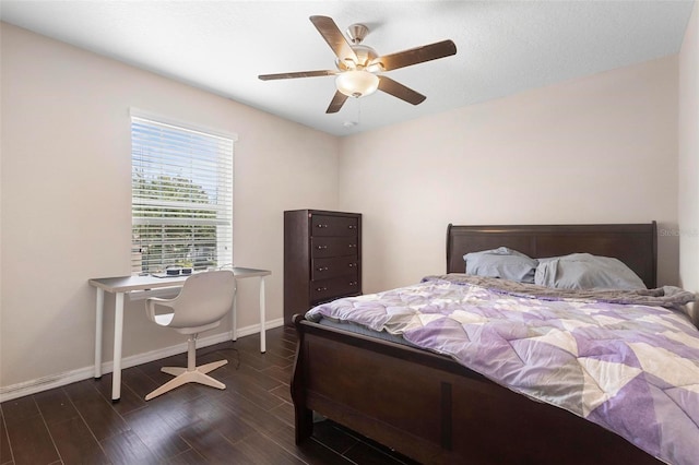 2136 J Lawson Blvd, Orlando, FL 32824 - bedroom with dark wood-style flooring, baseboards, and a ceiling fan