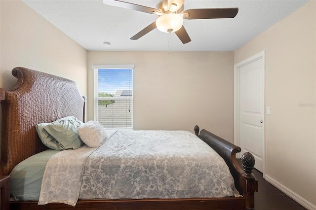 2136 J Lawson Blvd, Orlando, FL 32824 - bedroom with wood finished floors, baseboards, and ceiling fan