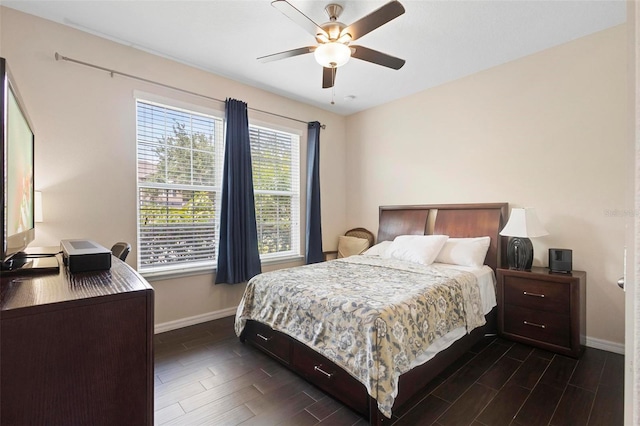 2136 J Lawson Blvd, Orlando, FL 32824 - bedroom with baseboards, dark wood-style floors, and ceiling fan