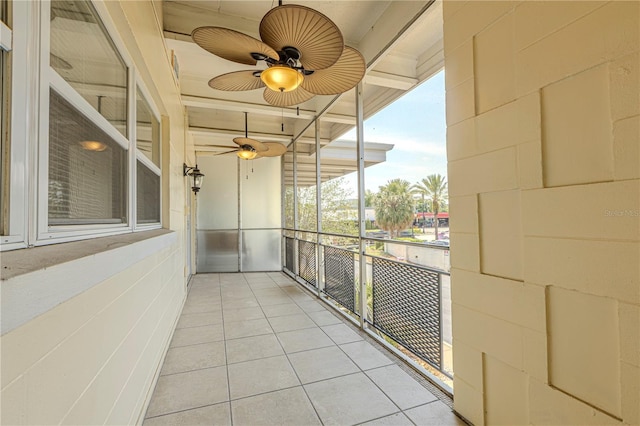 balcony featuring a ceiling fan