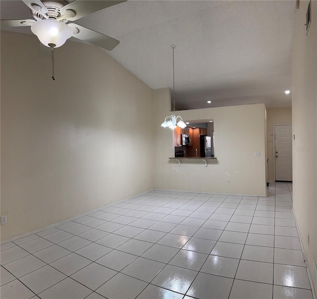14844 Laguna Beach Cir, Orlando, FL 32824 - unfurnished dining area with ceiling fan, light tile patterned floors, lofted ceiling, and recessed lighting