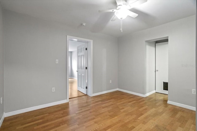 408 Eunice Dr, Plant City, FL 33563 - unfurnished bedroom featuring light wood finished floors, baseboards, and a ceiling fan