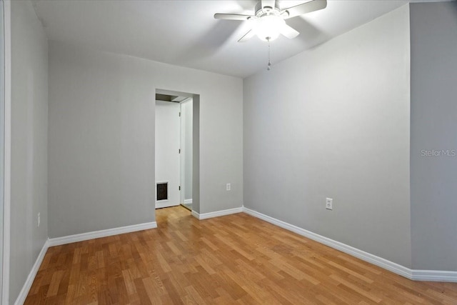 408 Eunice Dr, Plant City, FL 33563 - spare room featuring a ceiling fan, light wood-type flooring, and baseboards