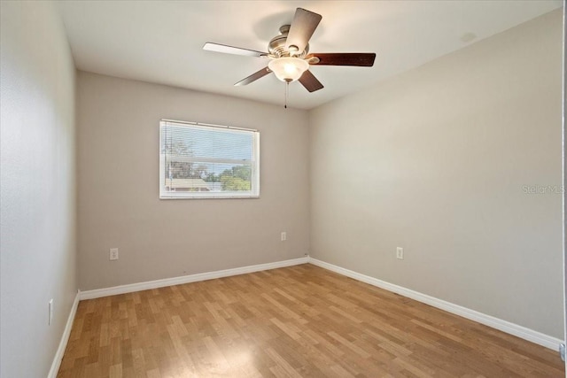 408 Eunice Dr, Plant City, FL 33563 - spare room featuring light wood-style floors, baseboards, and a ceiling fan