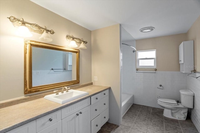 408 Eunice Dr, Plant City, FL 33563 - bathroom with toilet, vanity, tile walls, shower / bathtub combination, and tile patterned floors