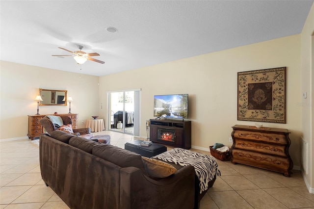 1286 Tallow Rd, Apopka, FL 32703 - living room with light tile patterned floors, a ceiling fan, and baseboards