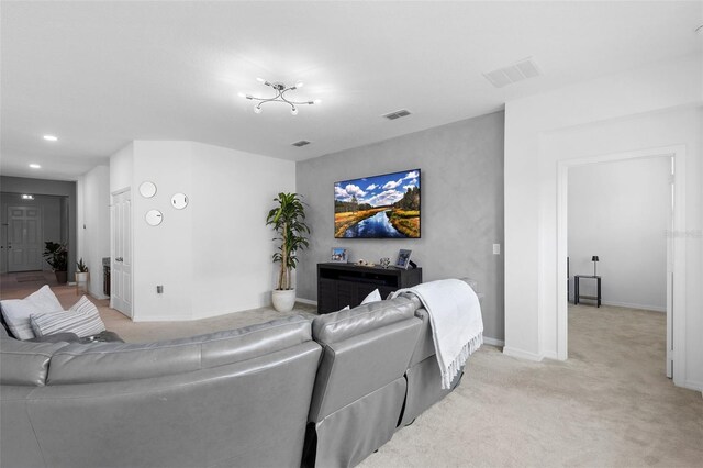 living area with light colored carpet, baseboards, and recessed lighting