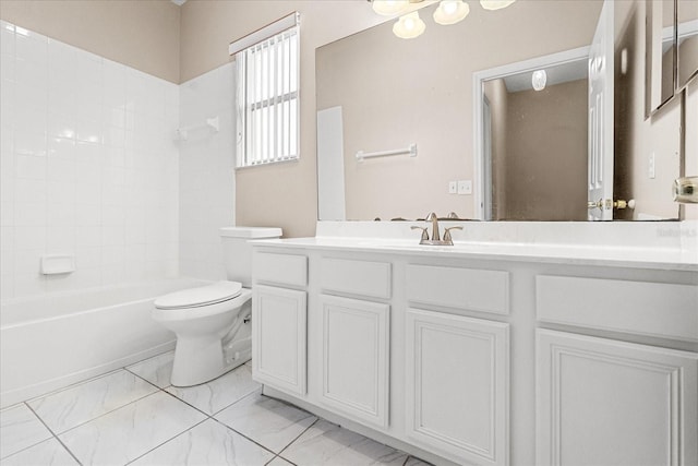 full bathroom with toilet, vanity, marble finish flooring, and shower / tub combination