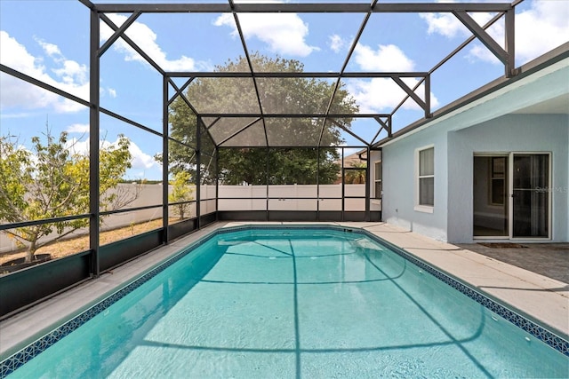 view of pool featuring a patio and a lanai