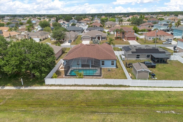 aerial view of residential area with a pool area