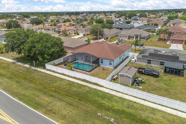 aerial view of residential area with a pool area
