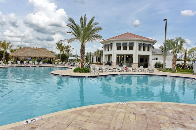 3150 Paradox Cir Unit 102, Kissimmee, FL 34746 - community pool with a patio and fence
