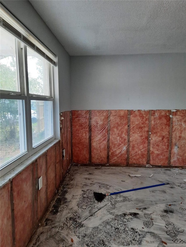 7240 Donna Dr, New Port Richey, FL 34652 - empty room with a textured ceiling