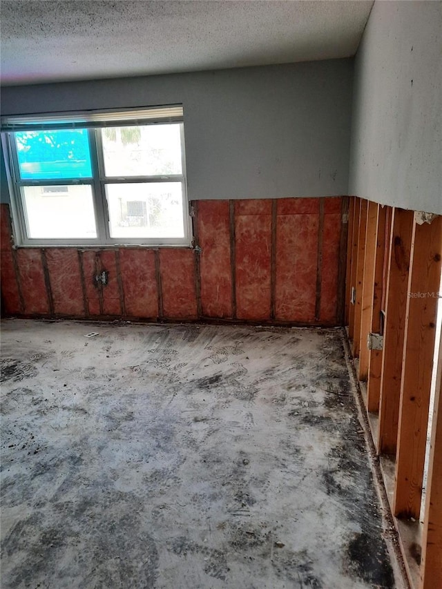 7240 Donna Dr, New Port Richey, FL 34652 - unfurnished room with a textured ceiling
