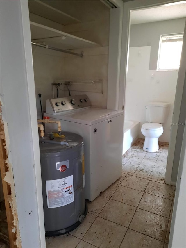 7240 Donna Dr, New Port Richey, FL 34652 - laundry area featuring washer / clothes dryer and electric water heater