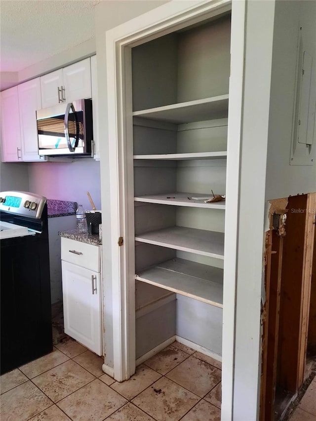 7240 Donna Dr, New Port Richey, FL 34652 - pantry featuring electric panel