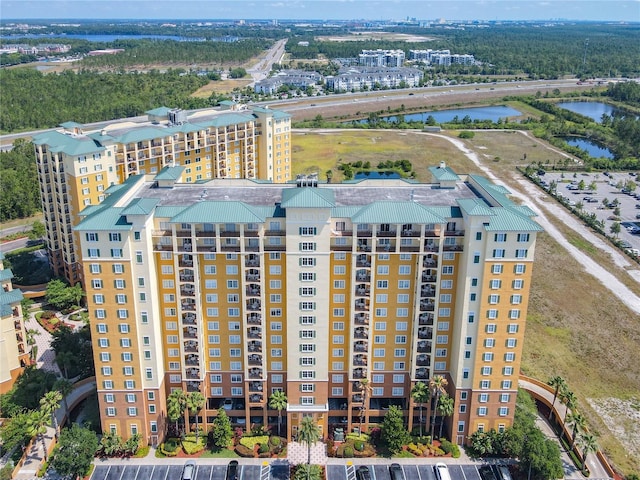 8101 Resort Village Dr, Orlando, FL 32821 - bird's eye view of a large body of water and apartment complex / building
