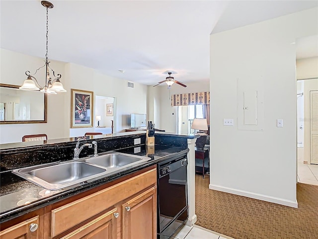 8101 Resort Village Dr, Orlando, FL 32821 - kitchen featuring black dishwasher, dark countertops, light tile patterned flooring, and a chandelier