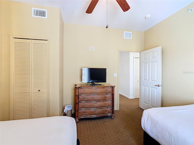 8101 Resort Village Dr, Orlando, FL 32821 - carpeted bedroom featuring a closet, a ceiling fan, and baseboards