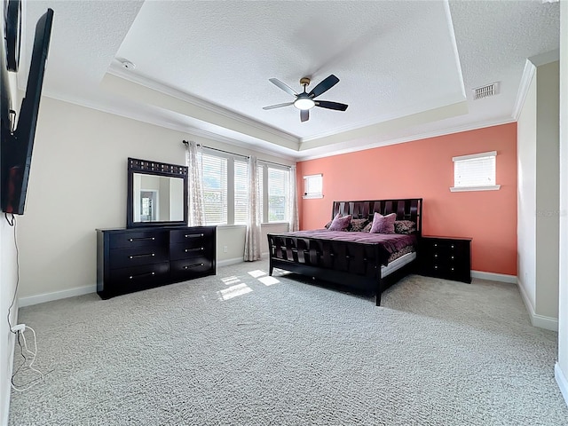 473 Oviedo Blvd, Oviedo, FL 32765 - carpeted bedroom featuring a raised ceiling, crown molding, a textured ceiling, baseboards, and ceiling fan