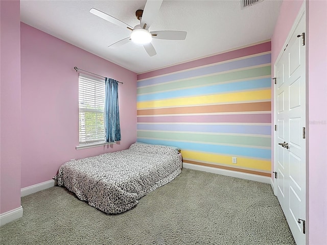 473 Oviedo Blvd, Oviedo, FL 32765 - carpeted bedroom featuring baseboards and a ceiling fan
