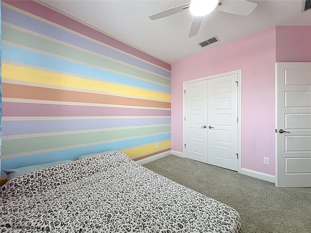 473 Oviedo Blvd, Oviedo, FL 32765 - bedroom with carpet floors, baseboards, a closet, and a ceiling fan
