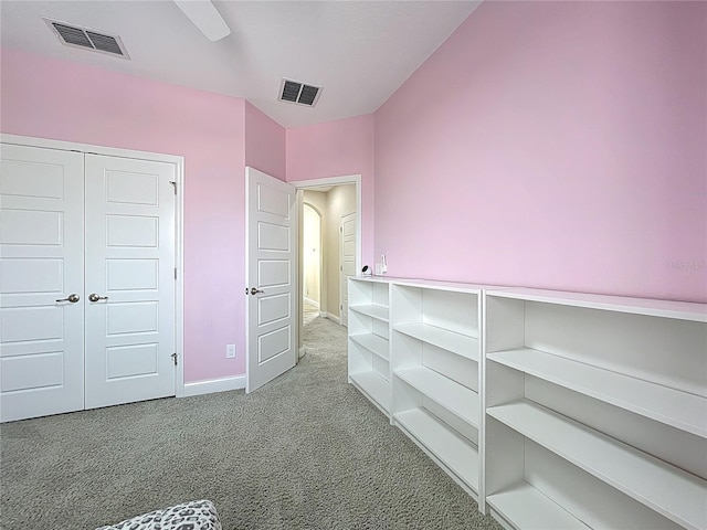 473 Oviedo Blvd, Oviedo, FL 32765 - unfurnished bedroom with carpet flooring, baseboards, and a closet