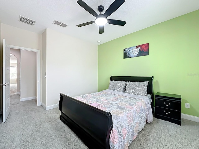 473 Oviedo Blvd, Oviedo, FL 32765 - carpeted bedroom with baseboards and a ceiling fan