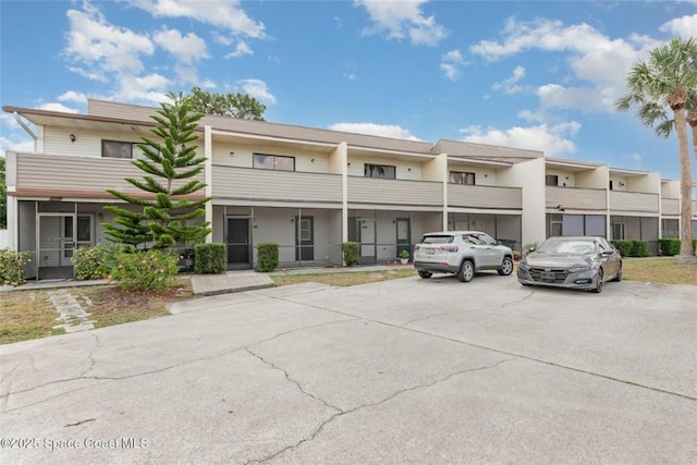 3164 Finsterwald Dr Unit 3164, Titusville, FL 32780 - view of property with uncovered parking