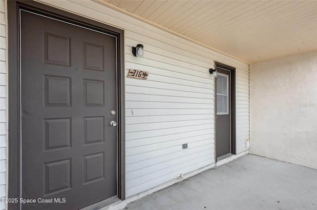3164 Finsterwald Dr Unit 3164, Titusville, FL 32780 - entrance to property with covered porch