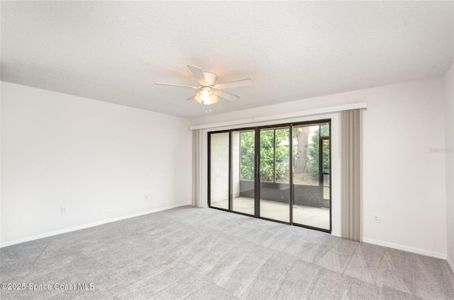 3164 Finsterwald Dr Unit 3164, Titusville, FL 32780 - carpeted spare room featuring a textured ceiling, ceiling fan, and baseboards