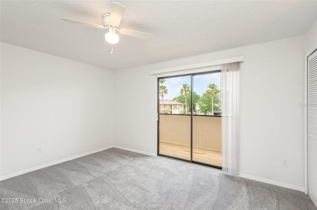 3164 Finsterwald Dr Unit 3164, Titusville, FL 32780 - carpeted empty room with a ceiling fan, baseboards, and a textured ceiling