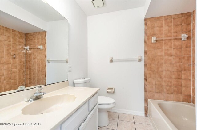 3164 Finsterwald Dr Unit 3164, Titusville, FL 32780 - full bathroom with tile patterned floors, toilet, vanity, and baseboards