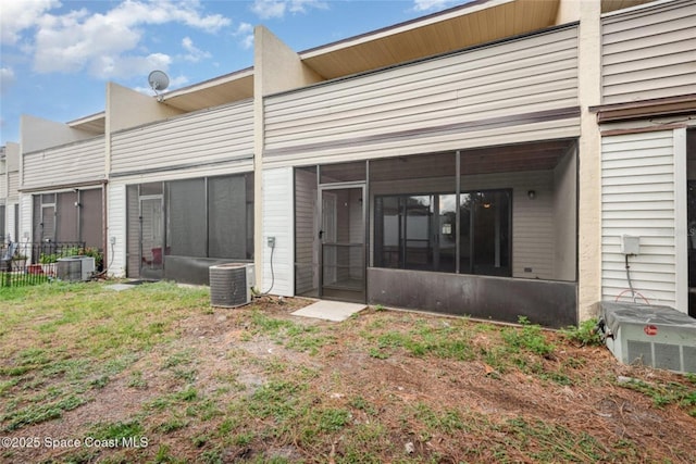 3164 Finsterwald Dr Unit 3164, Titusville, FL 32780 - rear view of property featuring central AC and a sunroom