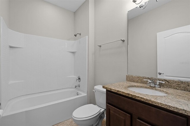 full bathroom featuring  shower combination, toilet, and vanity