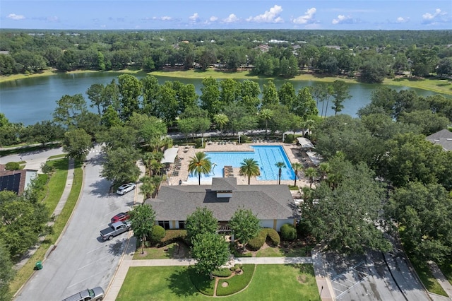 view of property location featuring a large body of water and a pool