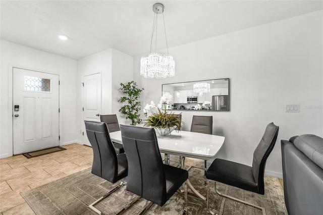16162 Arbor Crest Aly, Winter Garden, FL 34787 - dining room featuring a chandelier and baseboards