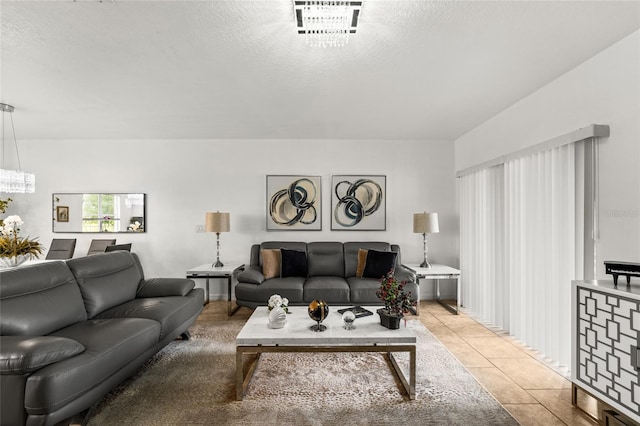 16162 Arbor Crest Aly, Winter Garden, FL 34787 - living area featuring light tile patterned floors and a textured ceiling
