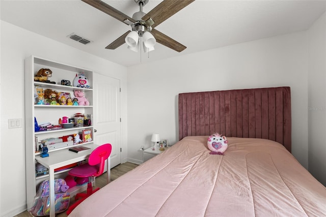 16162 Arbor Crest Aly, Winter Garden, FL 34787 - bedroom featuring wood finished floors, a ceiling fan, and baseboards