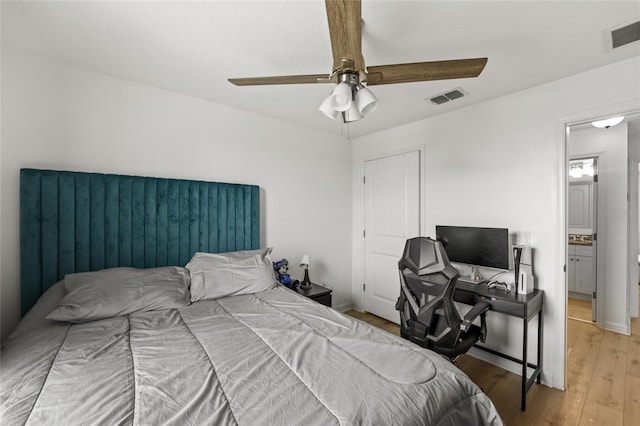 16162 Arbor Crest Aly, Winter Garden, FL 34787 - bedroom with wood finished floors, ceiling fan, and a desk