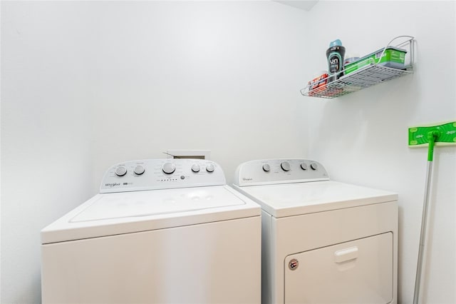 16162 Arbor Crest Aly, Winter Garden, FL 34787 - clothes washing area with washer and clothes dryer