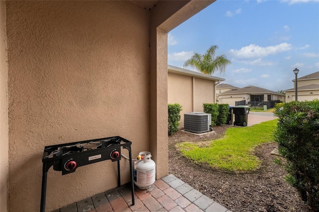 16162 Arbor Crest Aly, Winter Garden, FL 34787 - view of property exterior with stucco siding and central AC unit