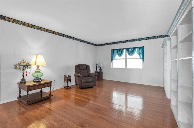 living area featuring wood finished floors
