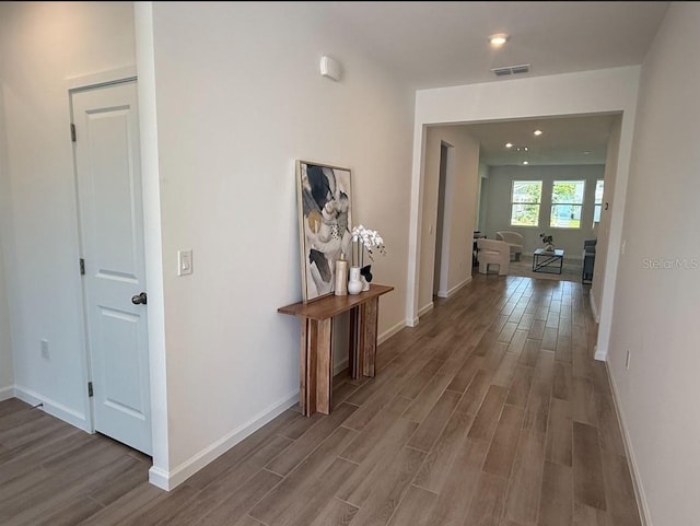 2681 Ginseng Ivy St, Apopka, FL 32703 - hallway with wood finished floors and baseboards