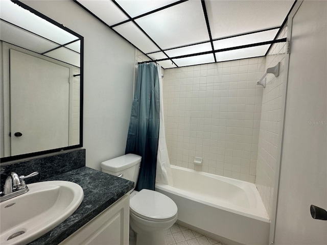 bathroom featuring toilet, shower / tub combo, vanity, and tile patterned flooring