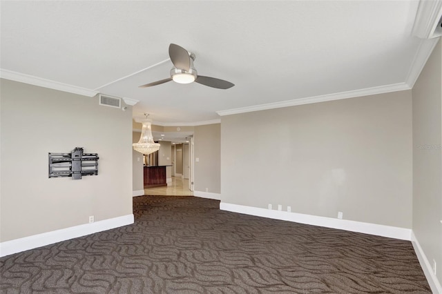 spare room featuring a ceiling fan, baseboards, ornamental molding, and dark colored carpet