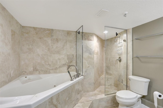 bathroom with toilet, a tub with jets, and tiled shower