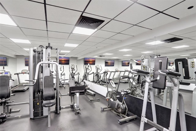 gym featuring a drop ceiling