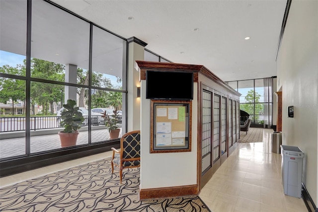 corridor featuring floor to ceiling windows